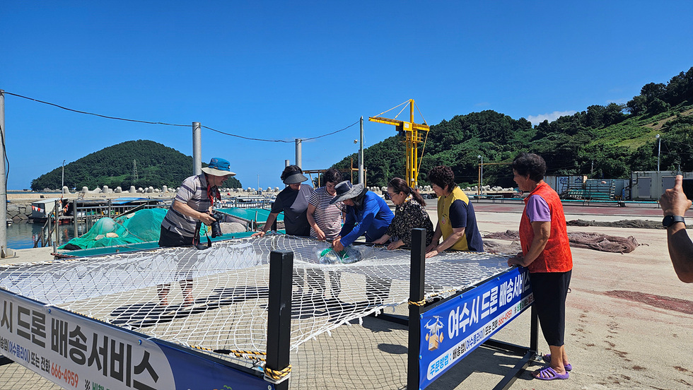 YeosuCityMayorJungGiMyoungislaunchingtheIslandDroneDeliveryCommercializationProjectfromJuly11toNovember21deliveringdailynecessitiesandfoodviadroneto10islandsinlogisticsvulnerableareas